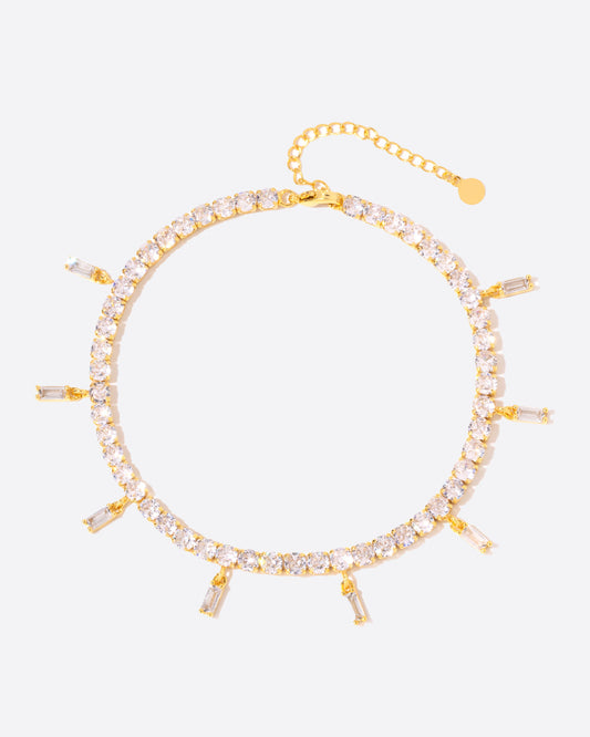 ICED BAGUETTE TENNIS ANKLET. - 4MM 18K GOLD